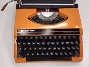 Silver reed typewriter orange