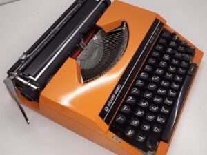 Silver reed typewriter orange
