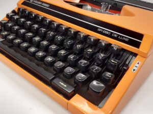 Silver reed typewriter orange