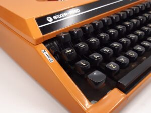 Silver reed typewriter orange