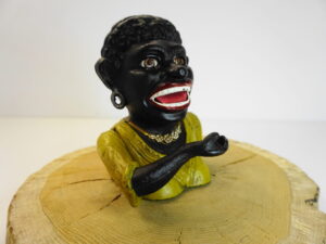 Dinah cast iron money bank