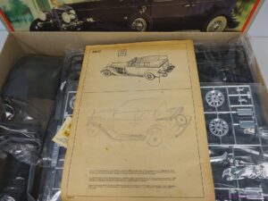 A vintage Revell 1933 Cadillac V-16 Town Car model kit
