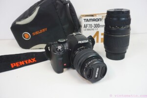 Pentax K-X DSLR camera (12.4 MP) with two lenses