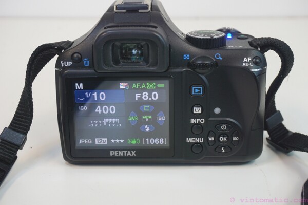 Pentax K-X DSLR camera (12.4 MP) with two lenses