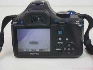 Pentax K-X DSLR camera (12.4 MP) with two lenses