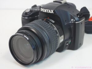 Pentax K-X DSLR camera (12.4 MP) with two lenses