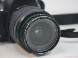 Pentax K-X DSLR camera (12.4 MP) with two lenses